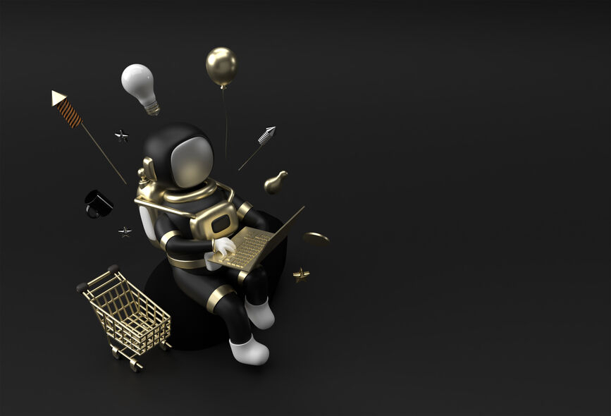 A 3D astronaut, dressed in black and gold, sits on a dark surface using a laptop.