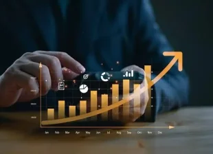 A person interacting with a smartphone, overlaid with a glowing upward-trending bar graph and icons indicating growth and progress. Business and technology theme.